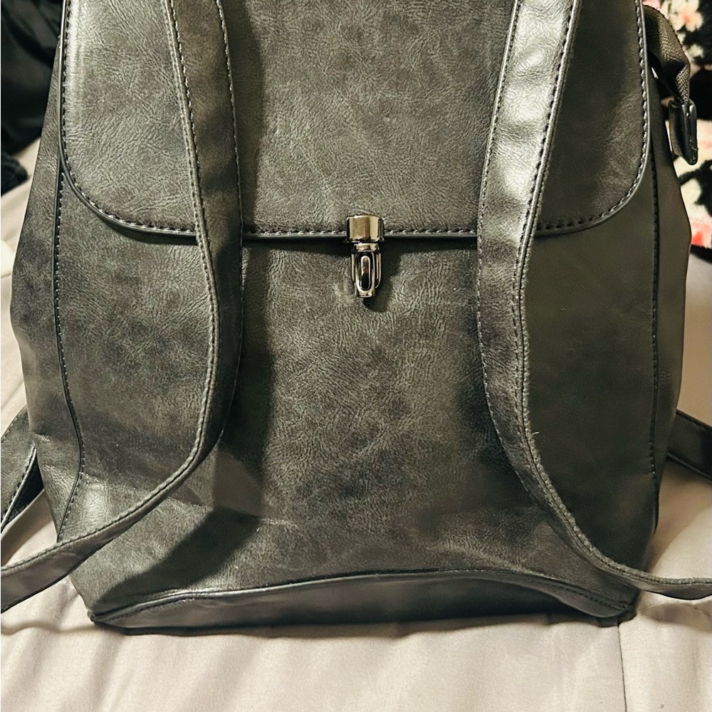 Stylish grey Leather purse/backpack